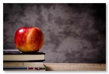 picture of an apple on a two books